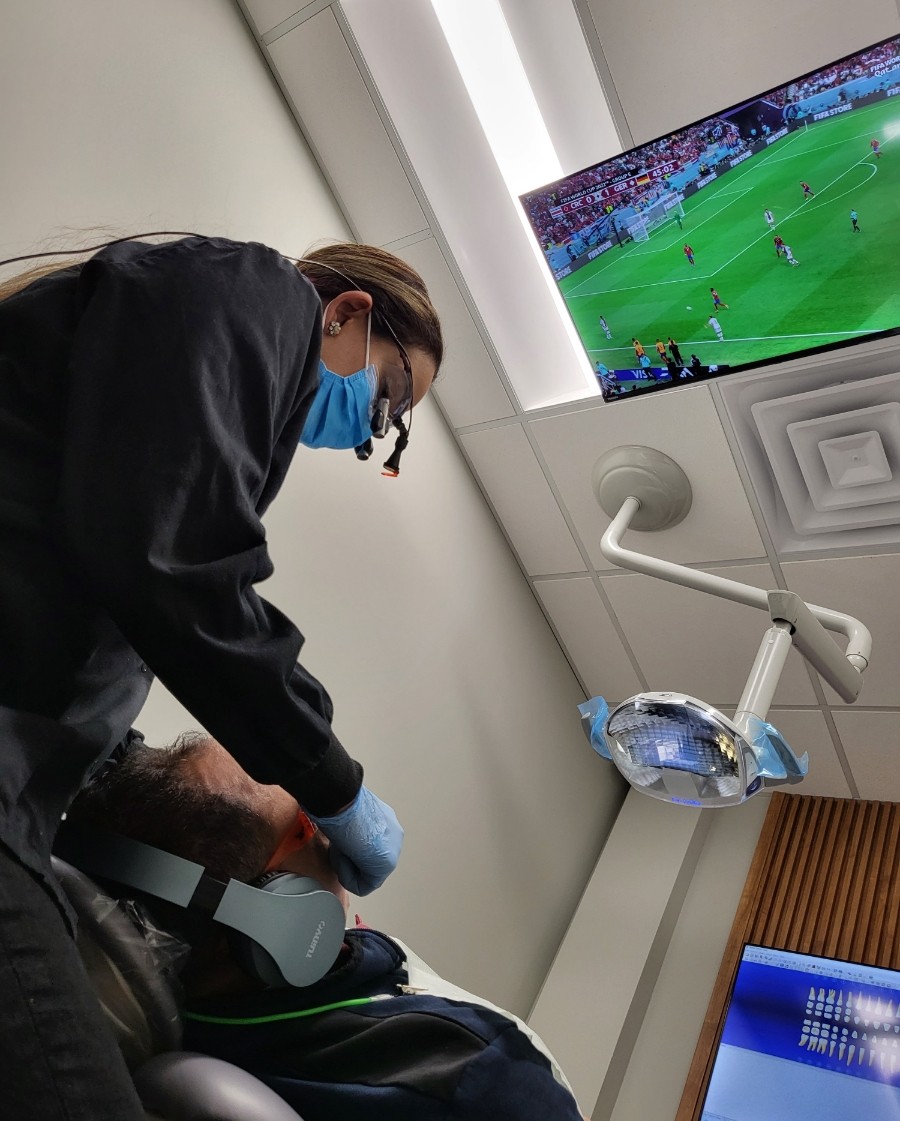 Doctor Elsaid treating a dental patient