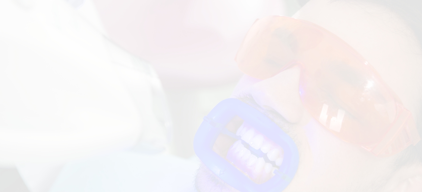 Man in dental chair getting professional teeth whitening in Parsippany Troy Hills