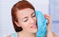 Lady has oral pain