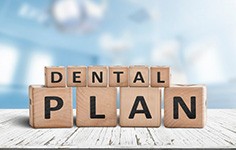 Blocks spell “dental plan”