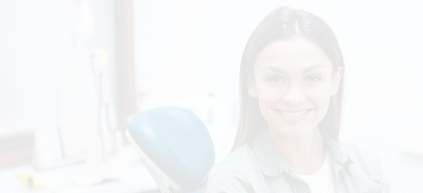 Smiling woman sitting in dental chair